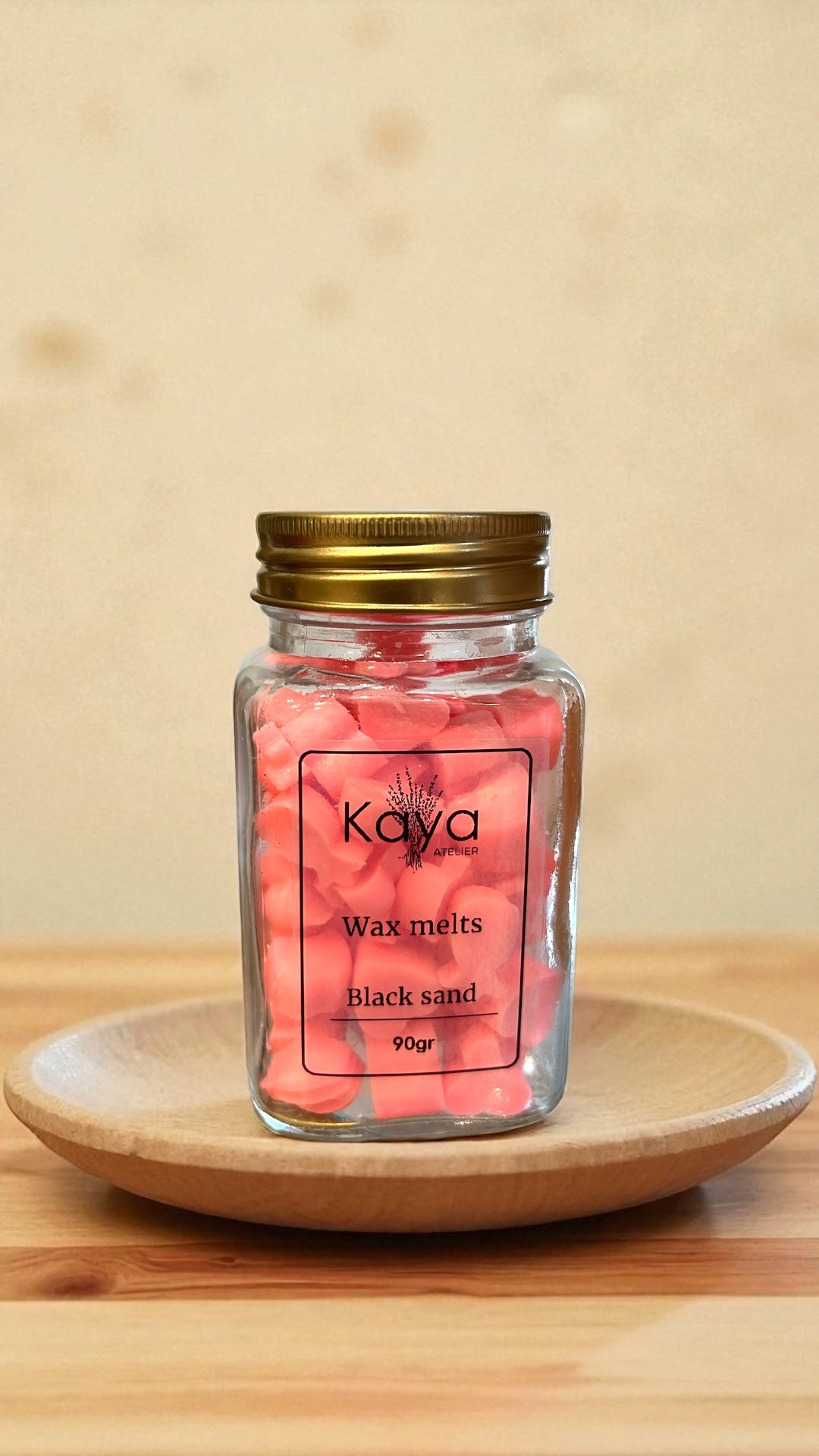 Wax melts Black sand