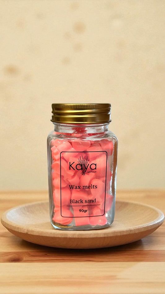 Wax melts Black sand